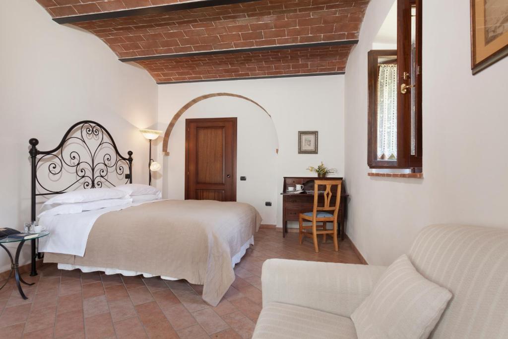Postel nebo postele na pokoji v ubytování Agriturismo La Collina