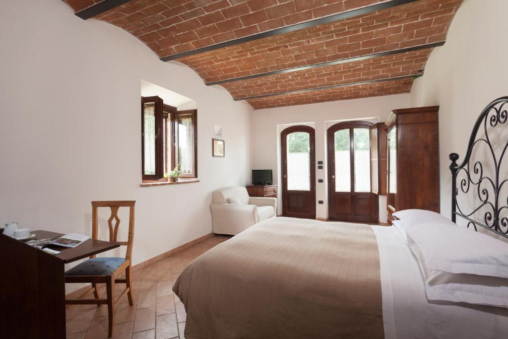 Postel nebo postele na pokoji v ubytování Agriturismo La Collina