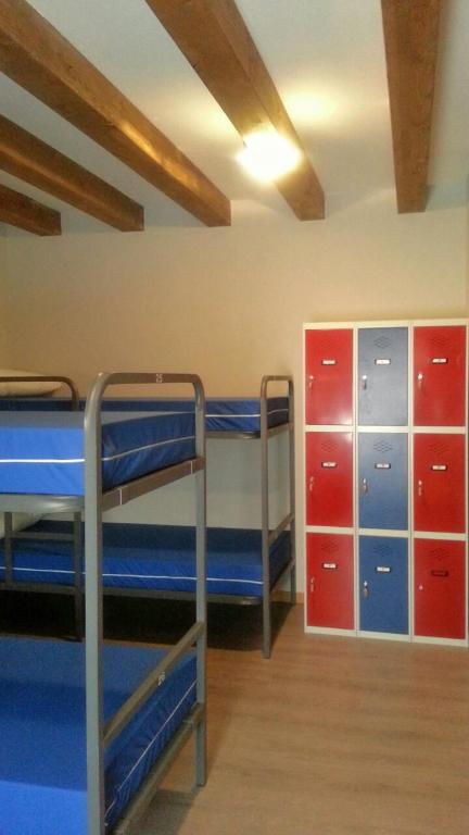 Postel nebo postele na pokoji v ubytování Albergue Orion