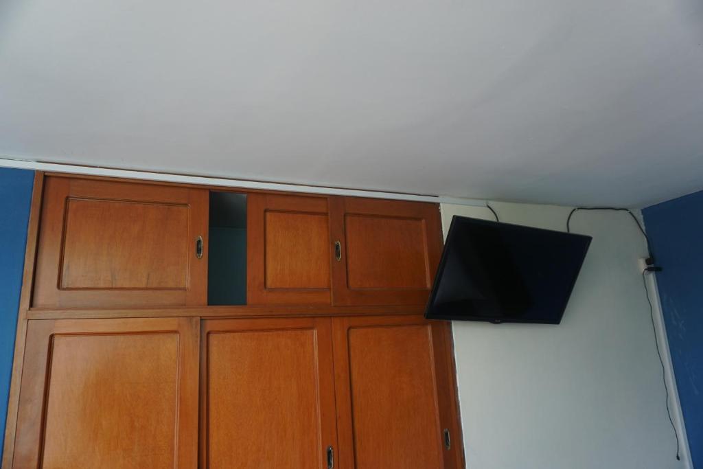 TV a/nebo společenská místnost v ubytování Residencial Mamamia