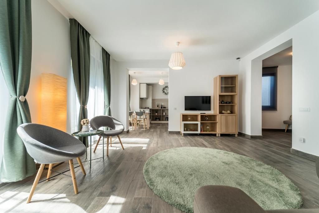 Un televizor și/sau centru de divertisment la Vila Cotroceni Boutique Apartments
