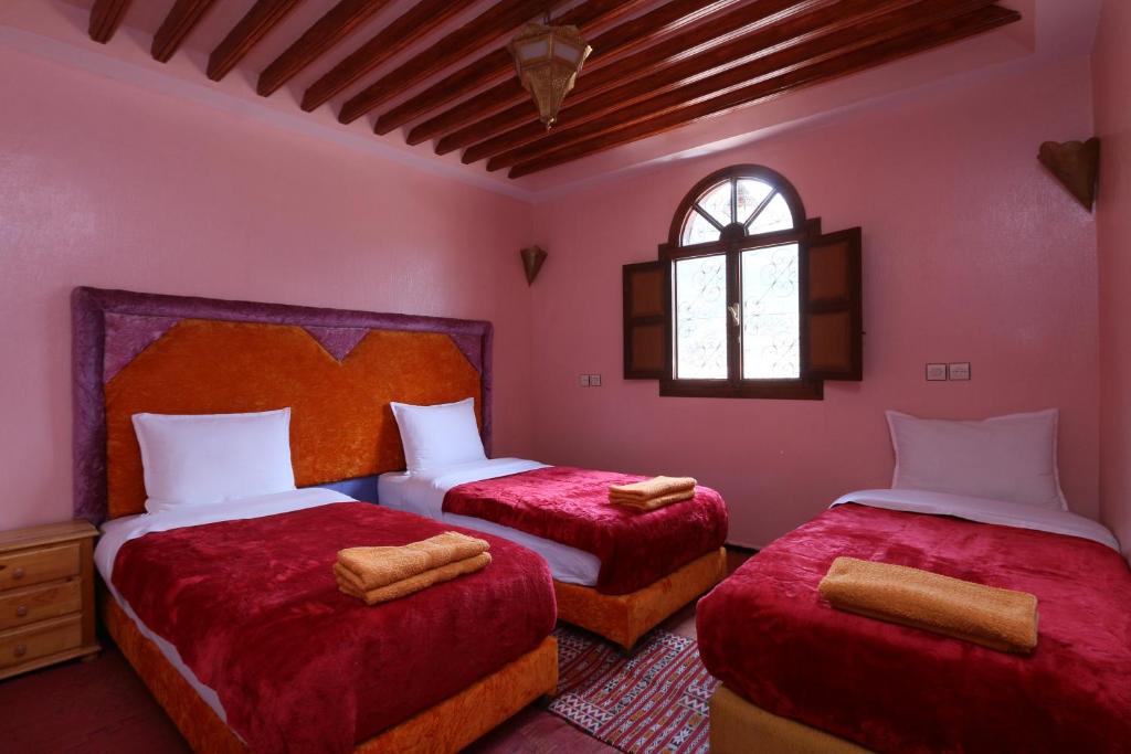 Postel nebo postele na pokoji v ubytování Tamatert Guest House