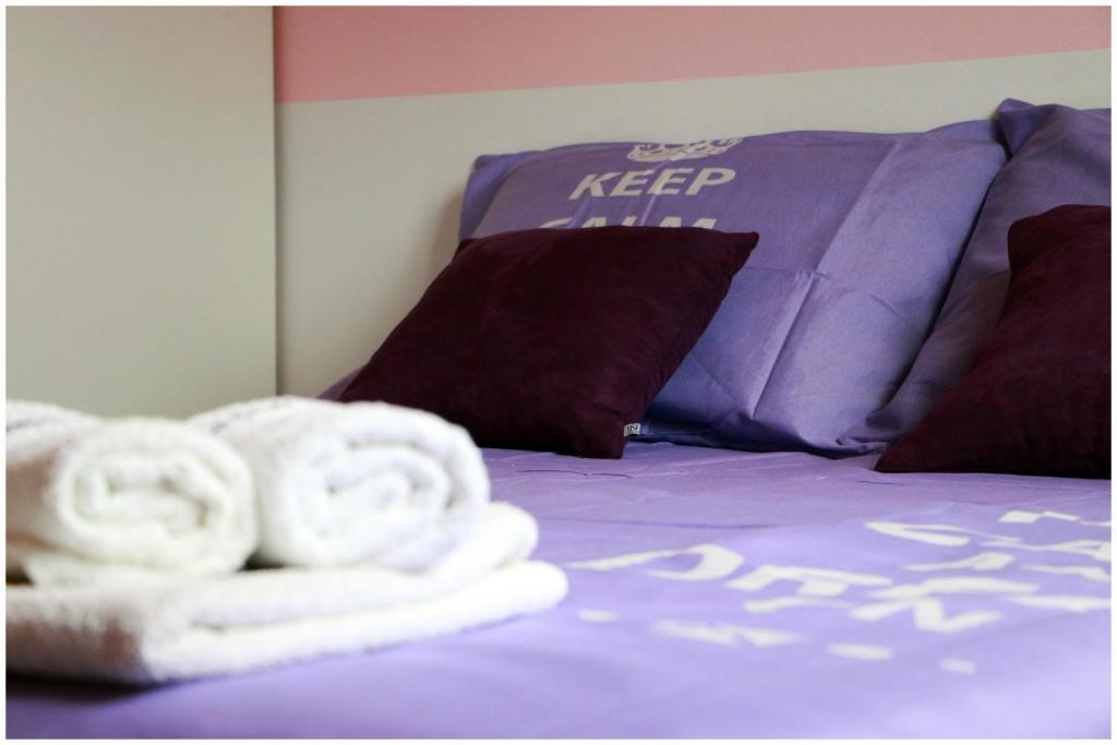 Postel nebo postele na pokoji v ubytování Apartman LORETTA