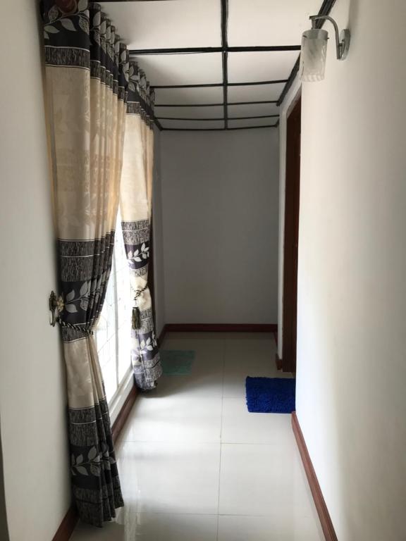 Voodi või voodid majutusasutuse Aerizo bungalow & Tours toas