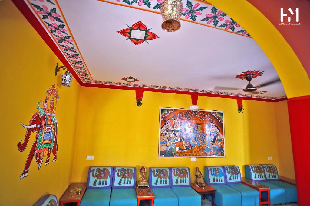Posezení v ubytování Ganpati Guest House