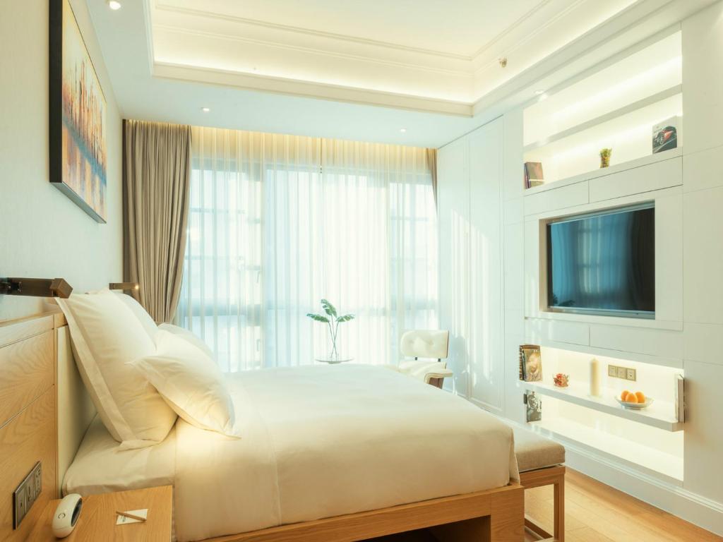 TV a/nebo společenská místnost v ubytování Residence G Nanshan