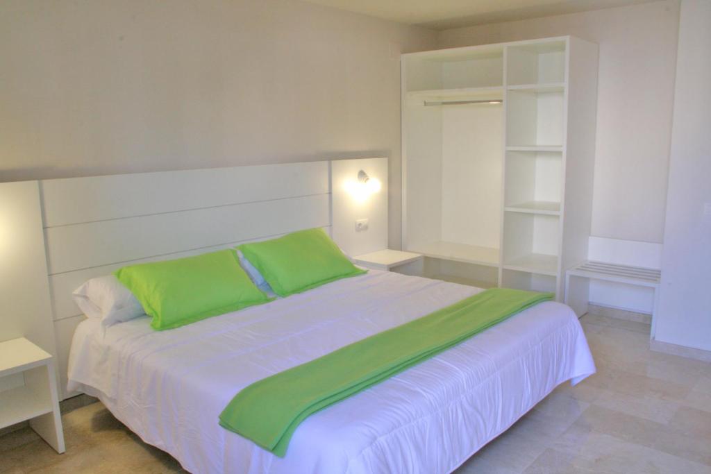 Postel nebo postele na pokoji v ubytování L' Escala Resort
