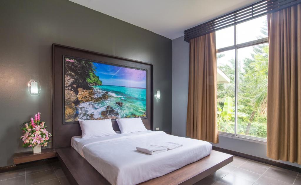 Postel nebo postele na pokoji v ubytování Krabi Home Town Boutique