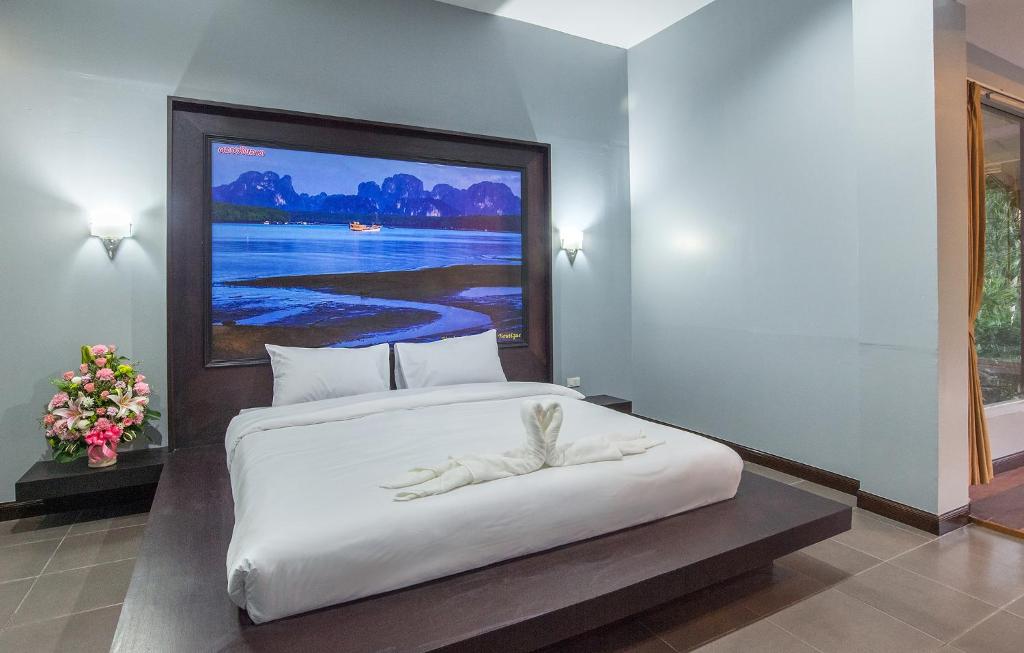 Postel nebo postele na pokoji v ubytování Krabi Home Town Boutique