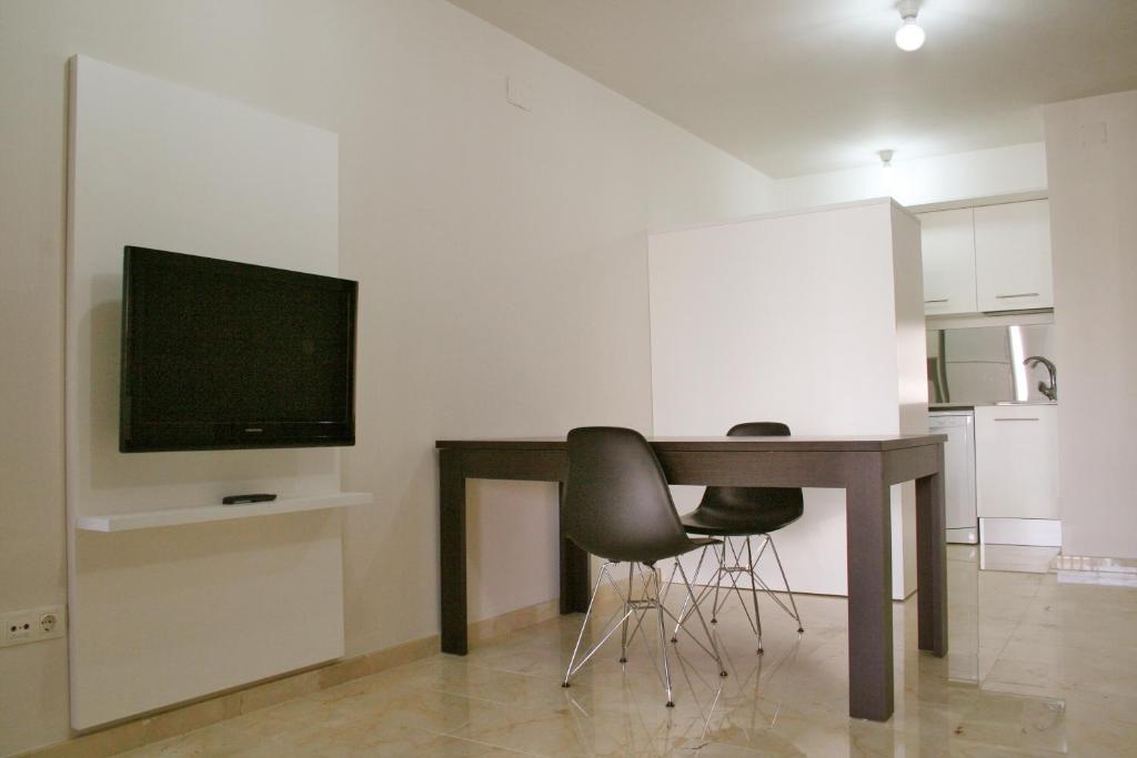 TV a/nebo společenská místnost v ubytování L' Escala Resort
