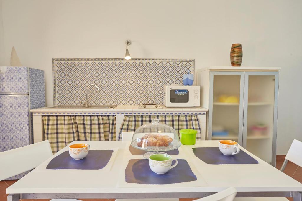 Eldhús eða eldhúskrókur á Residence Favignana
