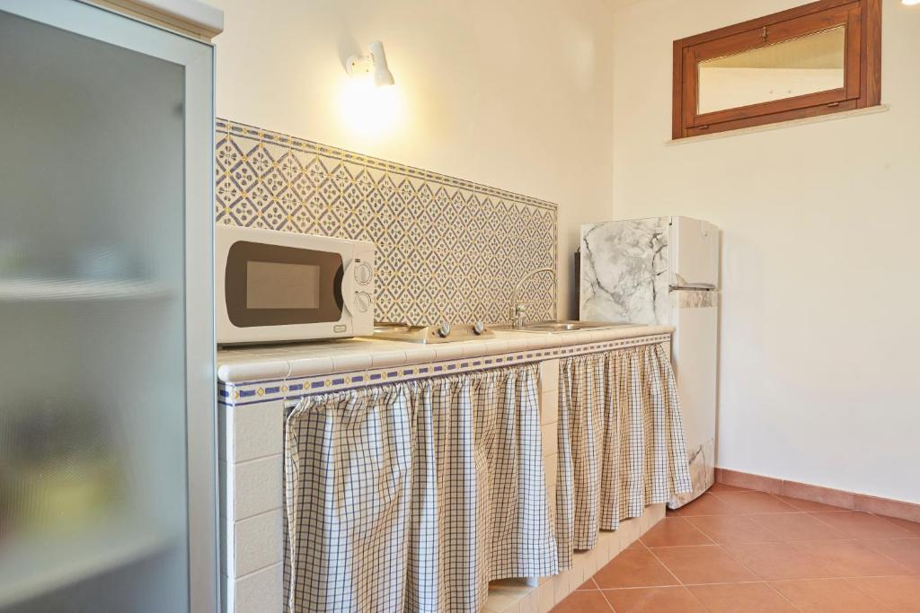 Eldhús eða eldhúskrókur á Residence Favignana