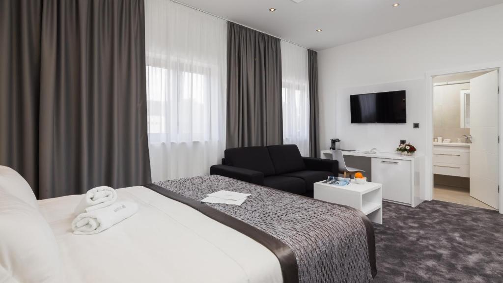 Posteľ alebo postele v izbe v ubytovaní Marina Baotić Apartments