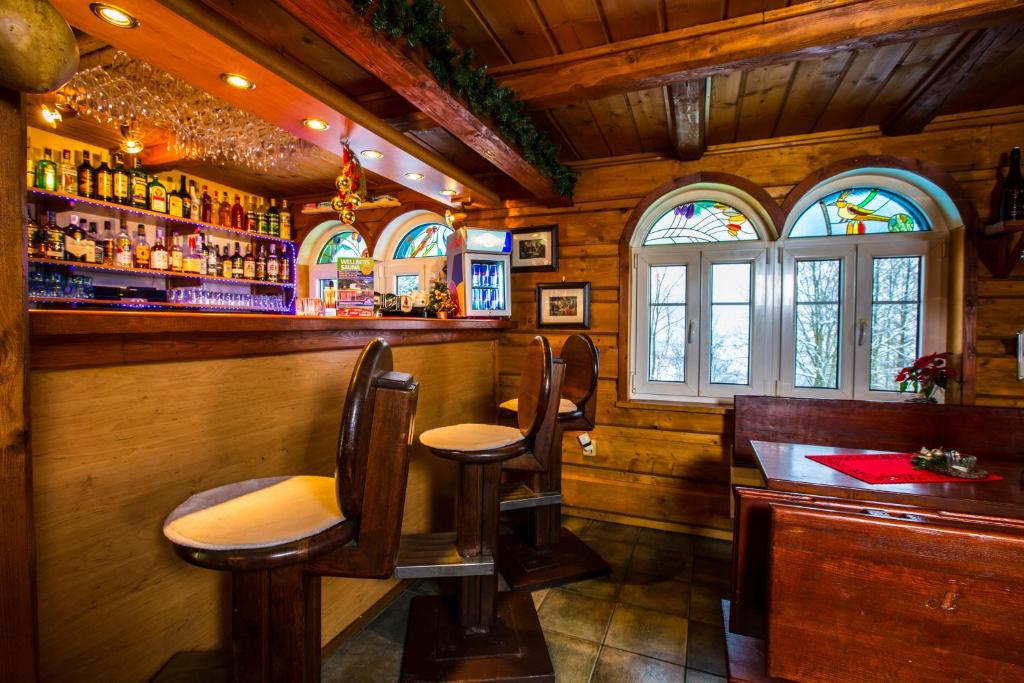 Lounge nebo bar v ubytování Chata Pod lipami