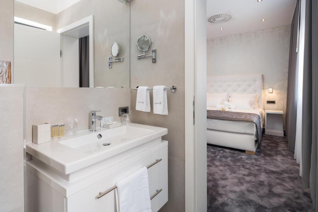 Posteľ alebo postele v izbe v ubytovaní Marina Baotić Apartments