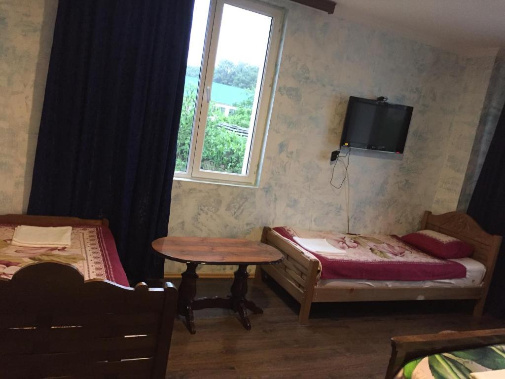 Postel nebo postele na pokoji v ubytování Hotel George