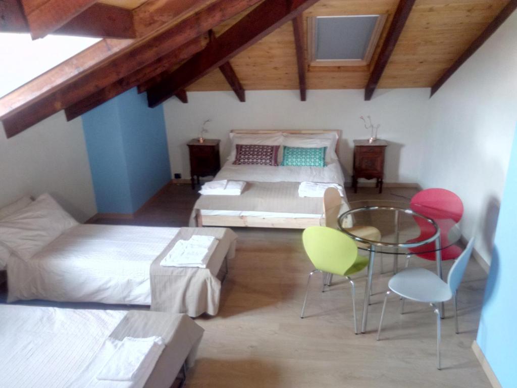 Postel nebo postele na pokoji v ubytování B&B Casa Danoi