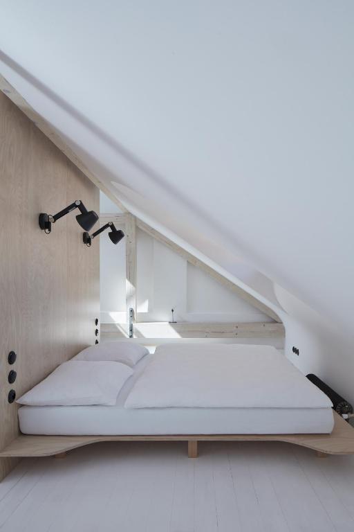 Łóżko lub łóżka w pokoju w obiekcie Štajnhaus