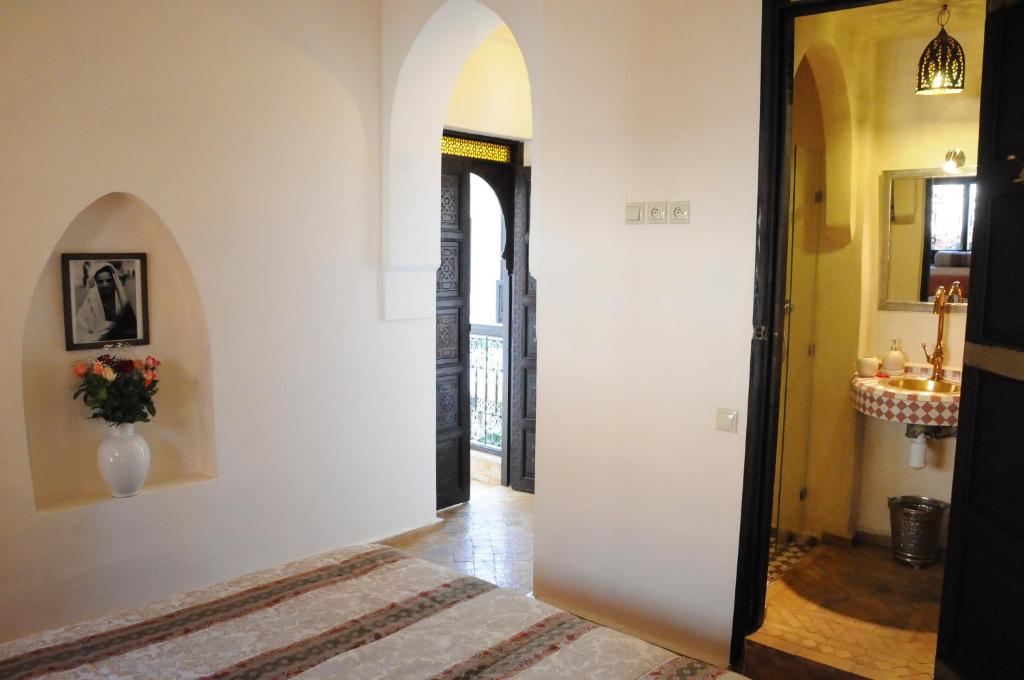 Postel nebo postele na pokoji v ubytování Riad Haraka