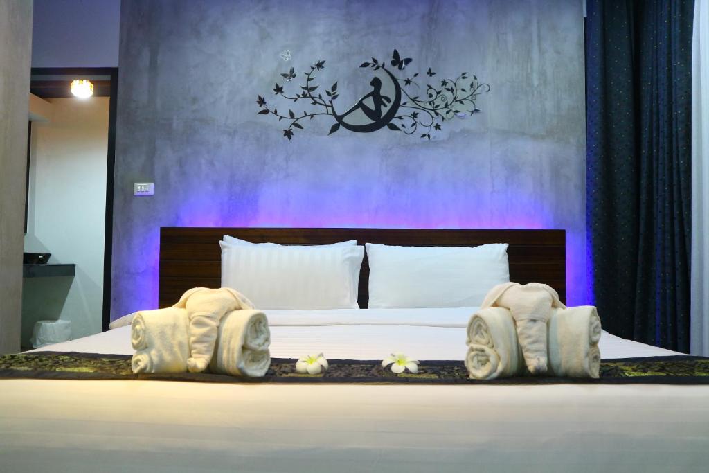 Voodi või voodid majutusasutuse Baan Norkna Bangtao toas