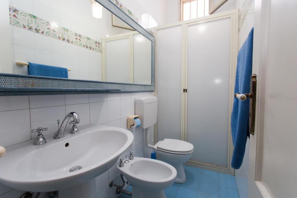 Koupelna v ubytování Hotel Poseidon
