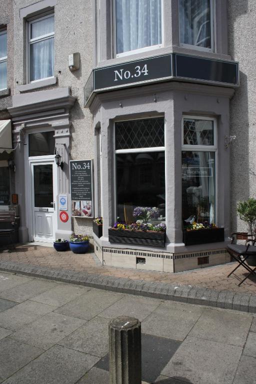 a no flower shop on a city street at No 34 in Blackpool