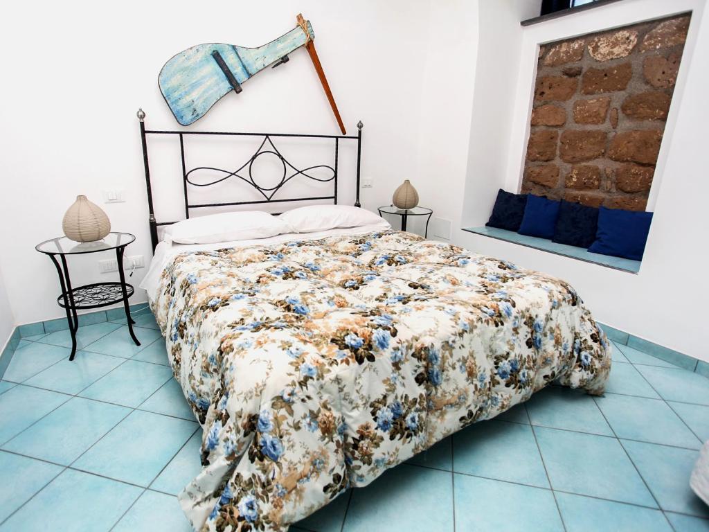 Posteľ alebo postele v izbe v ubytovaní B&B La Grotta Marina