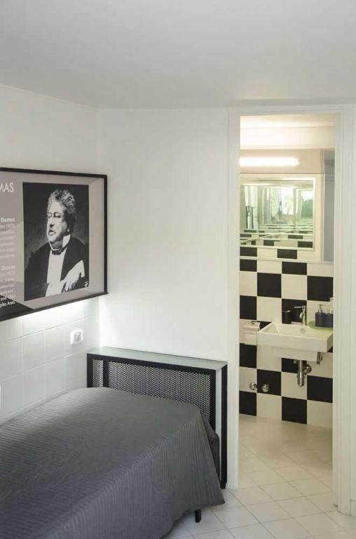 Postel nebo postele na pokoji v ubytování Muta House