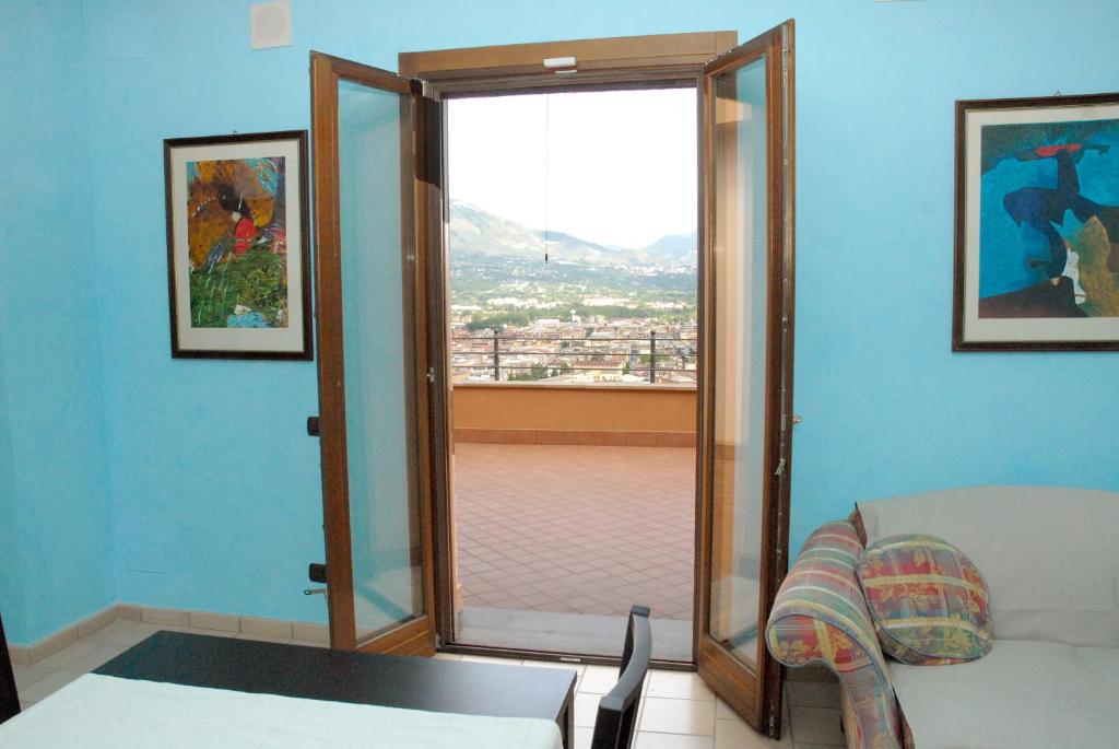 Letto o letti in una camera di La Residenza di Carolina