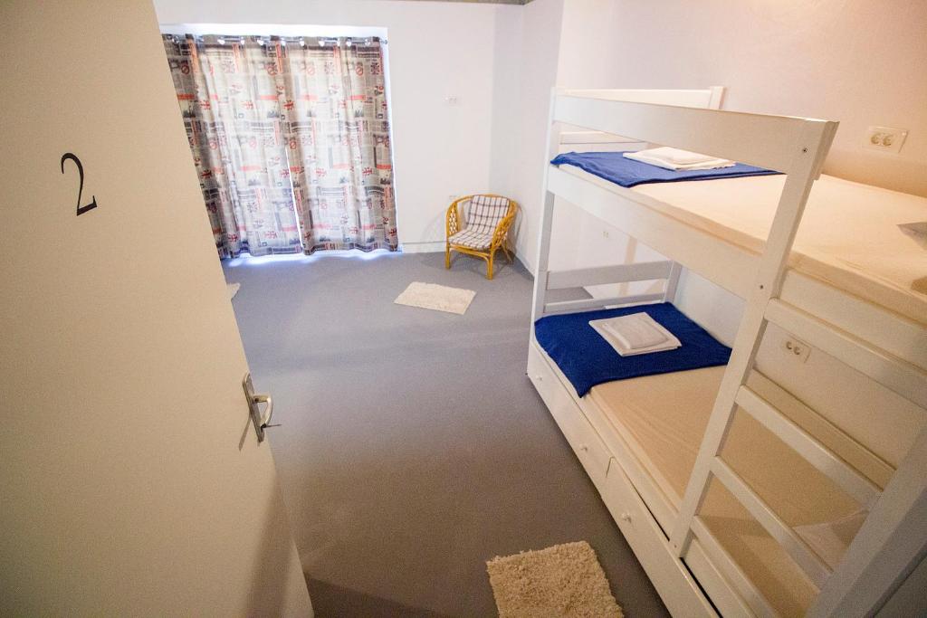 Posteľ alebo postele v izbe v ubytovaní Hostel Omiš