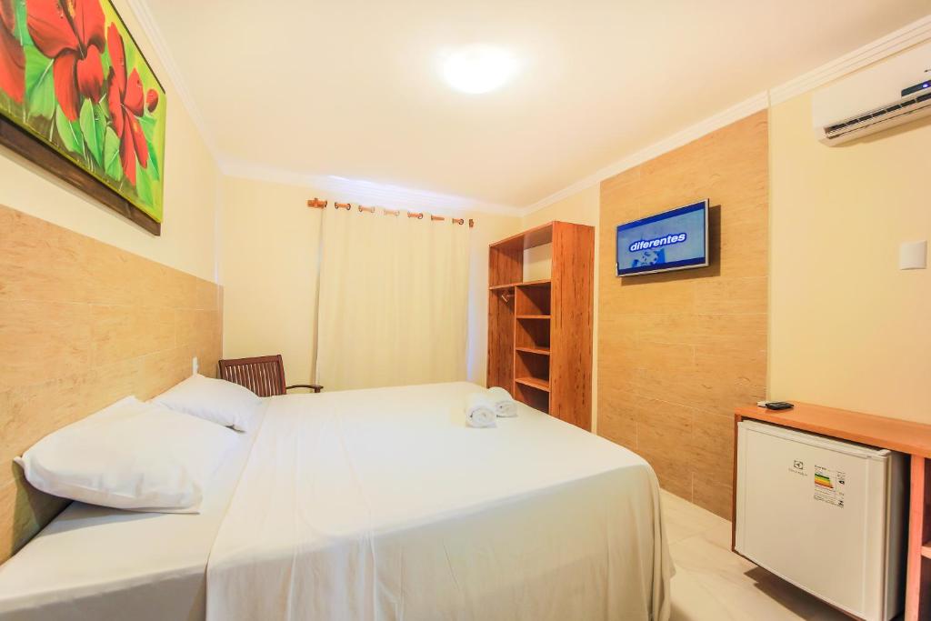 Postel nebo postele na pokoji v ubytování Vila Miola Hotel