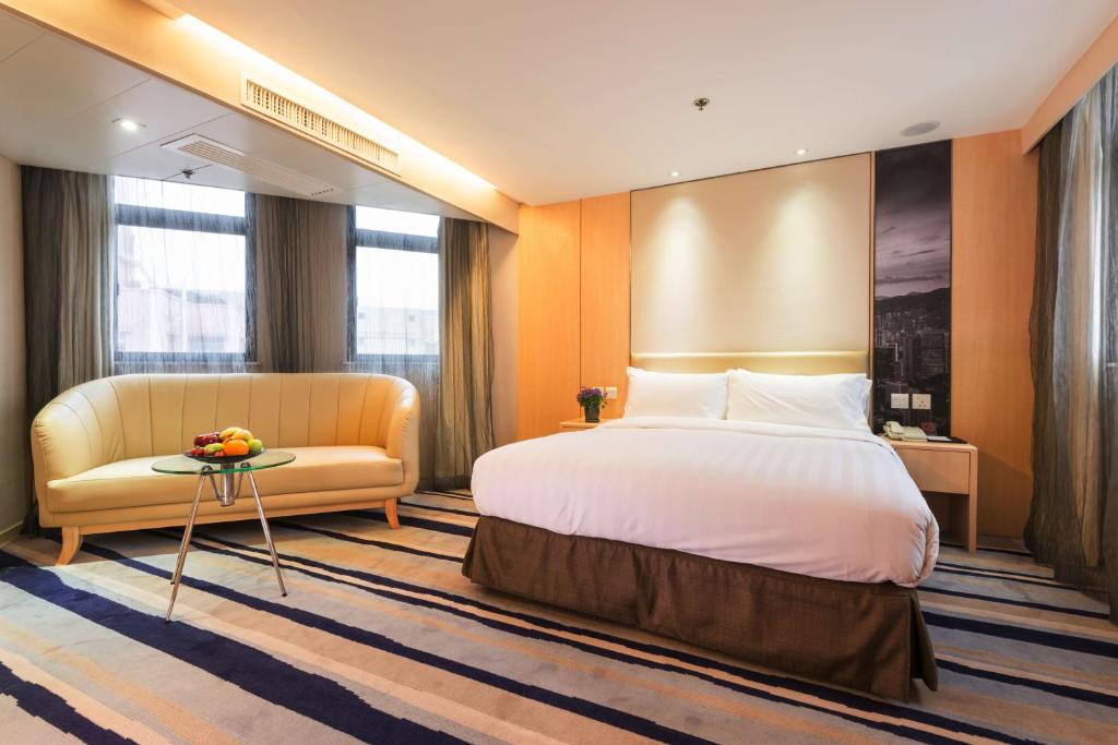 Letto o letti in una camera di Metropark Hotel Mongkok