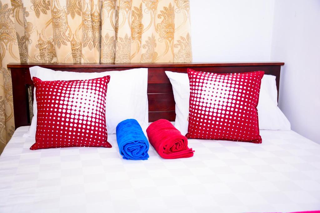 Postel nebo postele na pokoji v ubytování Marcelin Family Villa
