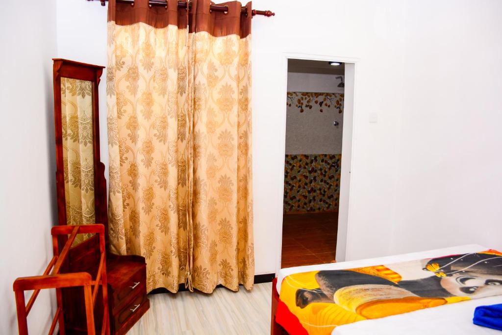 Postel nebo postele na pokoji v ubytování Marcelin Family Villa