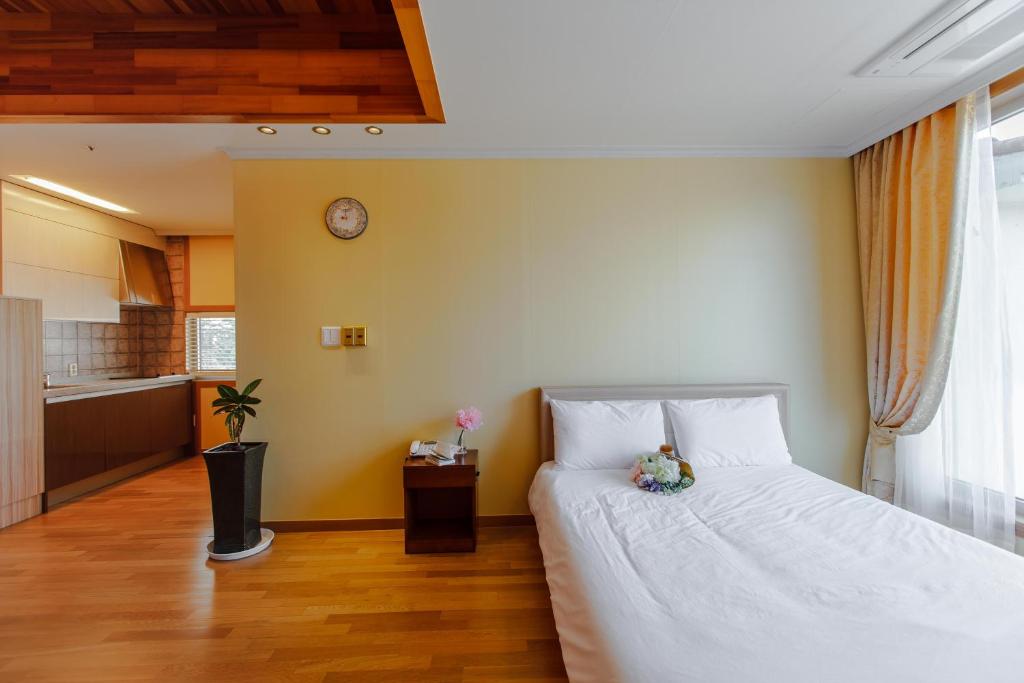 Postel nebo postele na pokoji v ubytování Harmony Resort
