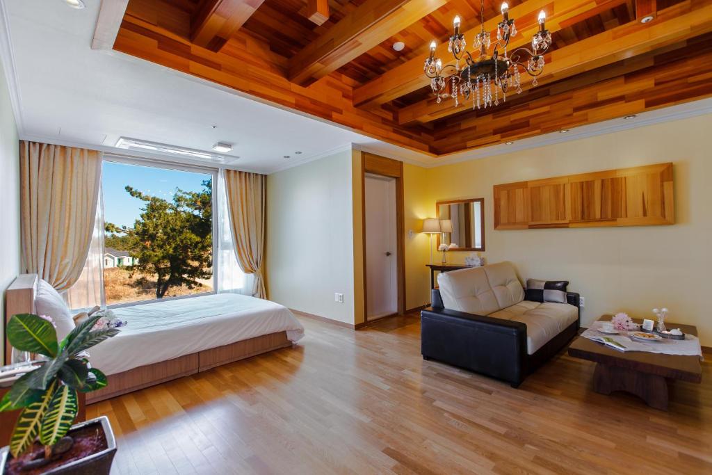 Postel nebo postele na pokoji v ubytování Harmony Resort