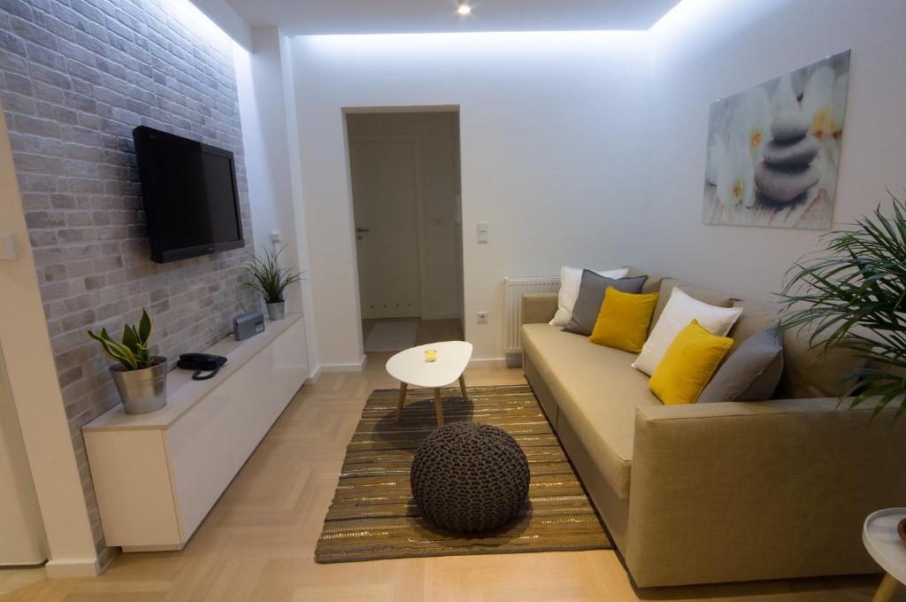 TV a/nebo společenská místnost v ubytování Paula Apartment