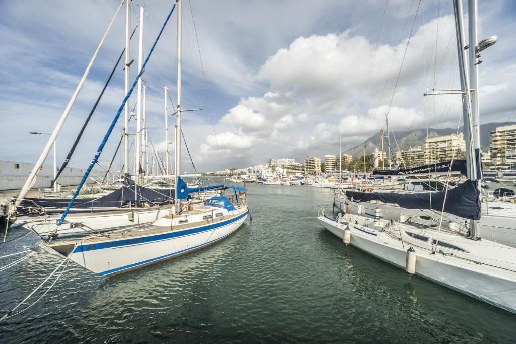 a group of boats docked in a harbor at Óbal Hotel Marbella in Marbella