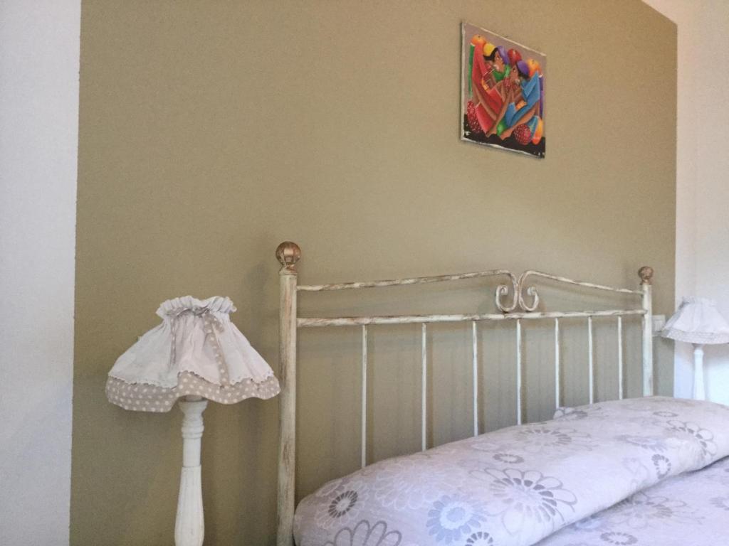 Postel nebo postele na pokoji v ubytování B&B Alloro