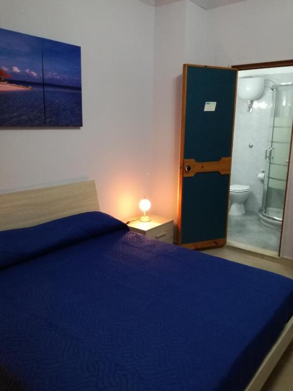 Postel nebo postele na pokoji v ubytování Albergo Primavera