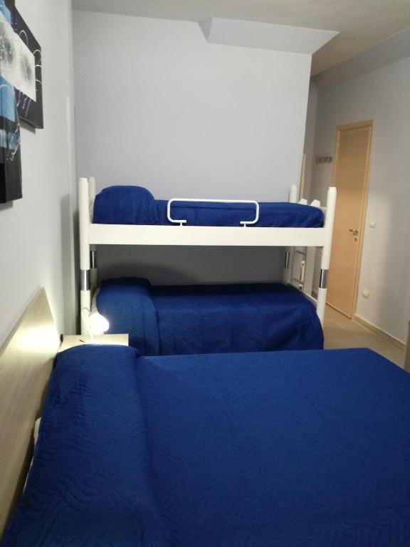 Postel nebo postele na pokoji v ubytování Albergo Primavera