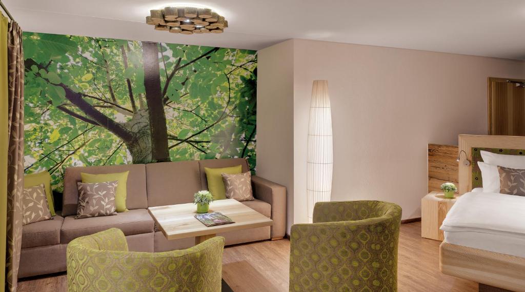 Posezení v ubytování Hotel der Bäume