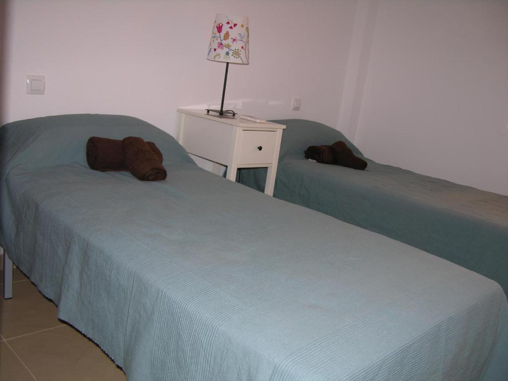 A bed or beds in a room at Albatros Playa 3 - 1307