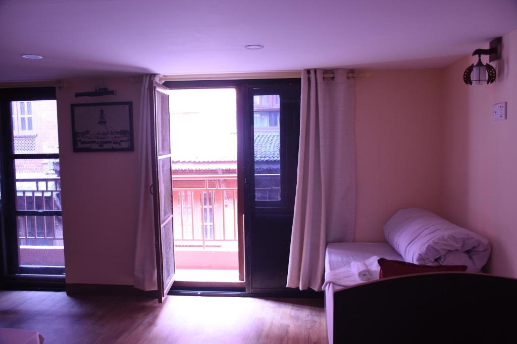 Postel nebo postele na pokoji v ubytování Subha Guest House