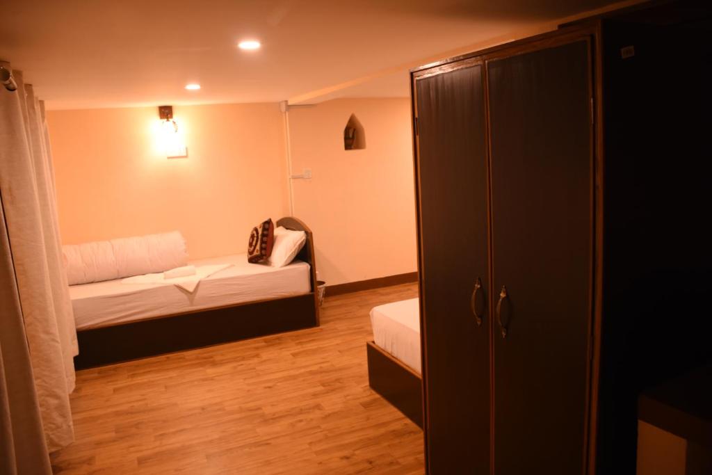 Postel nebo postele na pokoji v ubytování Subha Guest House