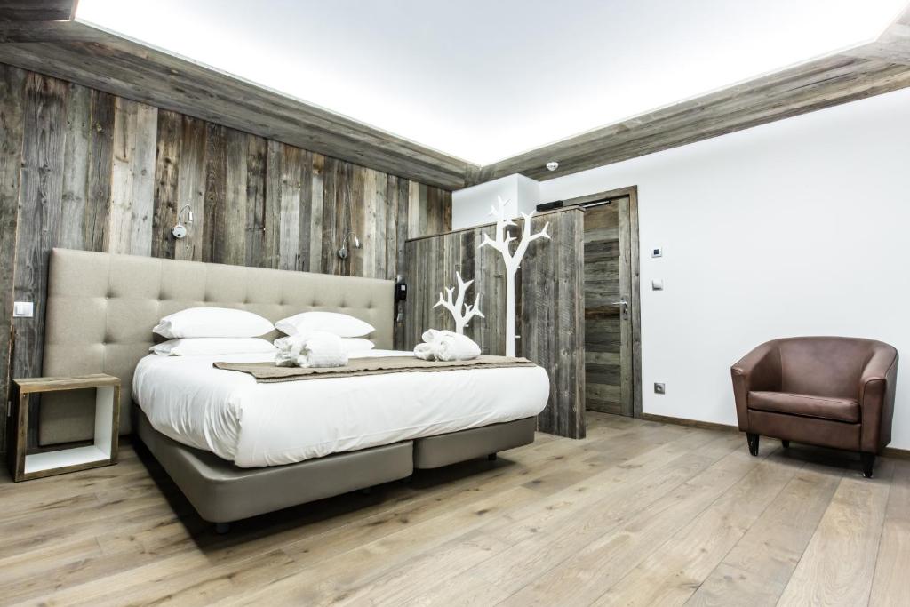 Postel nebo postele na pokoji v ubytování Hôtel Spa Crychar