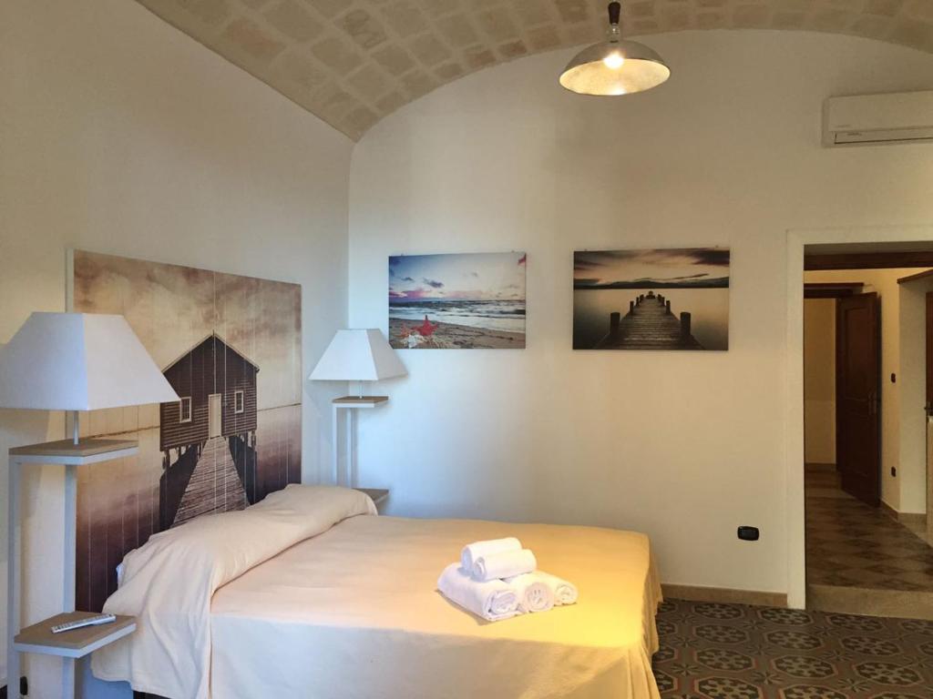 Postel nebo postele na pokoji v ubytování Hotel Plaza