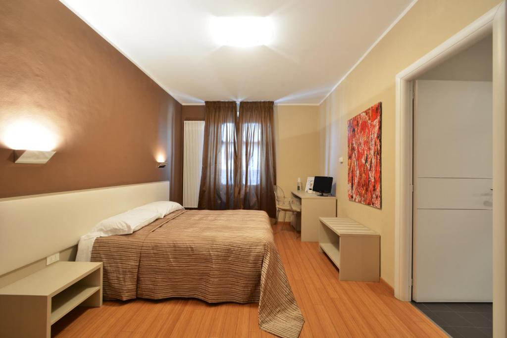 Postel nebo postele na pokoji v ubytování Matteotti25