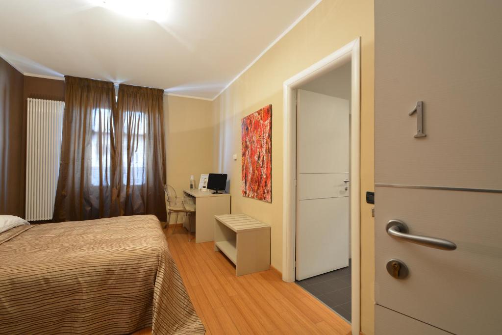 Postel nebo postele na pokoji v ubytování Matteotti25