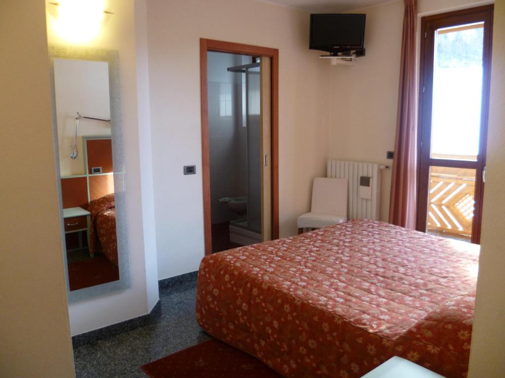 Postel nebo postele na pokoji v ubytování Hotel Derby